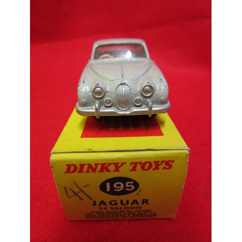 110 - Dinky Toys #195 Jaguar 3.4 Saloon, boxed, finished in grey with red interior. Box very good, vehicle... 