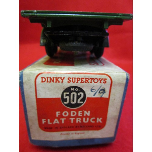 113 - Dinky Supertoys #502 Foden Flat Truck finished in rare green, boxed. Box very good with some foxing ... 