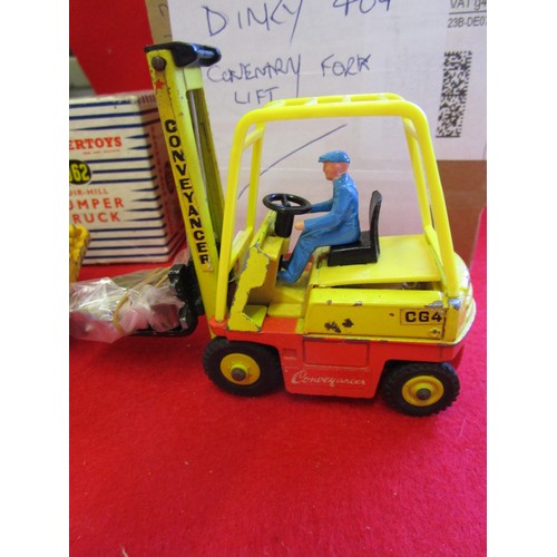 125 - Dinky Supertoys #962 Muir-Hill Dumper Truck, boxed and a Dinky Supertoys #404 Coventry Fork Lift, un... 