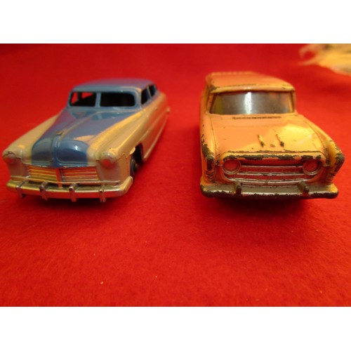 137 - Dinky Toys Hudson Sedan in dark blue over grey and a Dinky #173 Nash Rambler in pink with blue flash... 