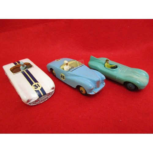 142 - A Dinky Toys #133 Cunningham CR-5, a Dinky Toys #107 Sunbeam Alpine and a Dinky Toys #238, all in ve... 