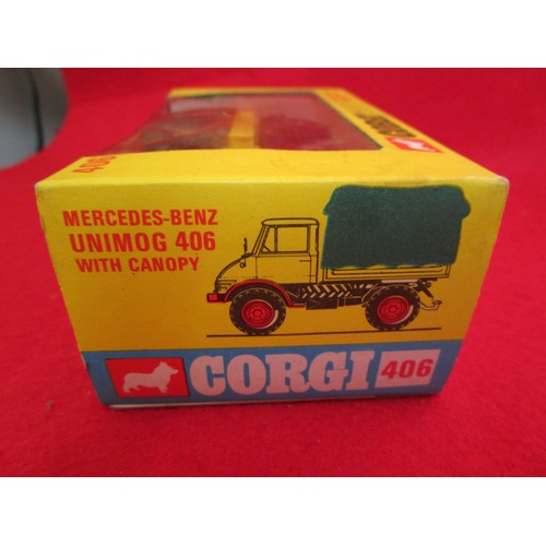 146 - Corgi Toys #406 Mercedes-Benz Unimog 406 with Canopy, boxed, model mint, box very good.