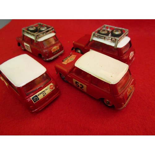 152 - A set of 4 Corgi BMC Mini Cooper 'S' in rally livery: 2 x Monte Carlo Rally #177 with roof racks; 1 ... 