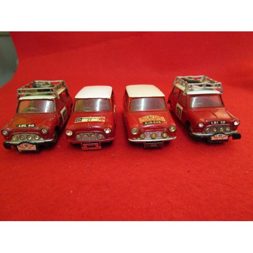 152 - A set of 4 Corgi BMC Mini Cooper 'S' in rally livery: 2 x Monte Carlo Rally #177 with roof racks; 1 ... 