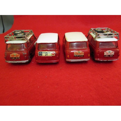 152 - A set of 4 Corgi BMC Mini Cooper 'S' in rally livery: 2 x Monte Carlo Rally #177 with roof racks; 1 ... 