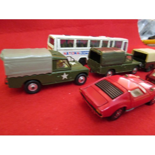 153 - Corgi Toys: a selection of unboxed vehicles comprising; 2 x Land Rover 109 W.B. military, one playwo... 