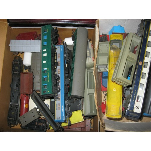 1040 - A large box of assorted rolling stock, both carriages and goods wagons, mainly Hornby but with vario... 