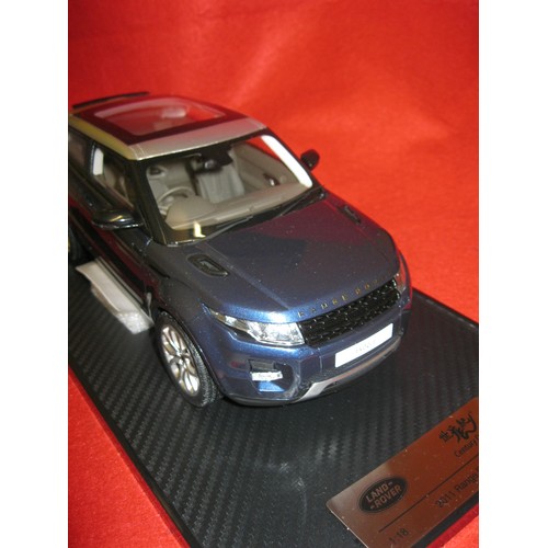 231 - A Century Dragon Resin model of a 2011 Range Rover Evoque, official Land-Rover product, with papers,... 