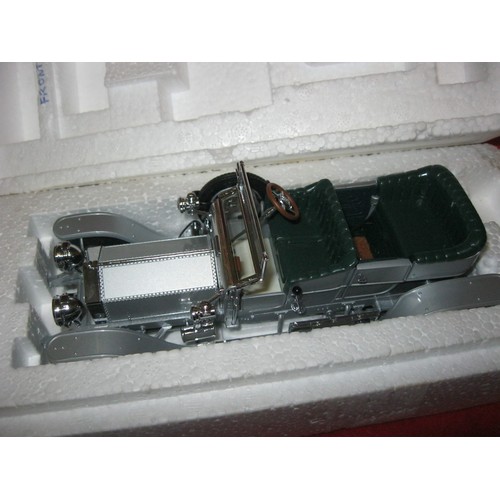 235 - A Franklin Mint 1907 Rolls Royce Silver Ghost, issued 1989, boxed, mint, with papers etc.