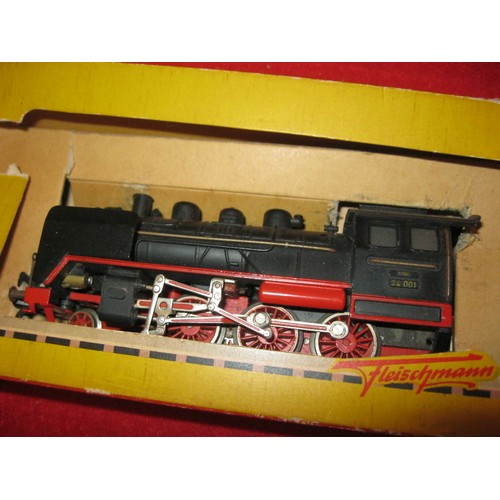 1088 - A Fleischmann 24001 2-6-0 Steam Locomotive of metal construction with matching tender, in box, box p... 