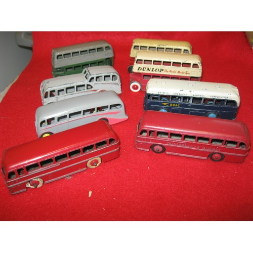 243 - A selection of 8 Dinky buses comprising 3 Routemasters, two in red and cream (one with original Dunl... 