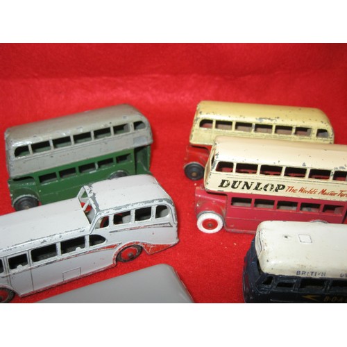 243 - A selection of 8 Dinky buses comprising 3 Routemasters, two in red and cream (one with original Dunl... 