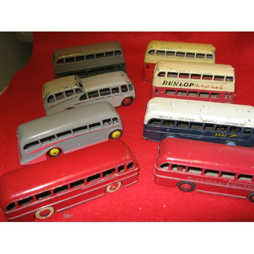 243 - A selection of 8 Dinky buses comprising 3 Routemasters, two in red and cream (one with original Dunl... 