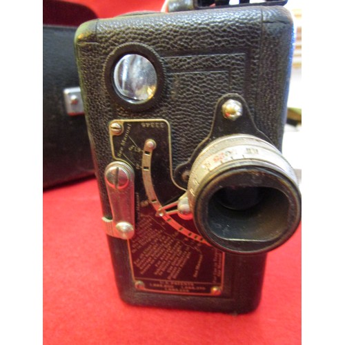 245 - A vintage Kodak Model B Cine camera, clockwork mechanism in working order, in good condition and pre... 