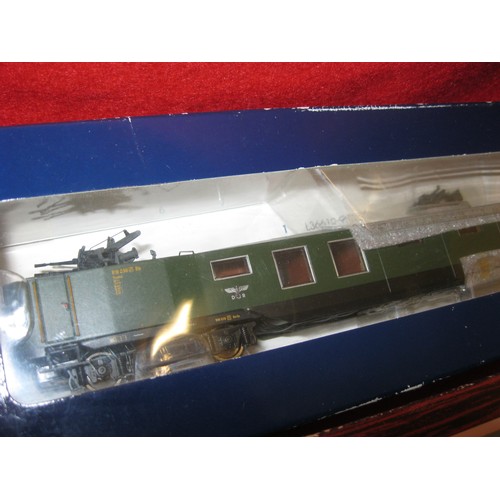 1096 - An assortment of carriages, 4 boxed, comprising:
Bachmann Liliput L336611 Flakwagen, L385301 Autotra... 