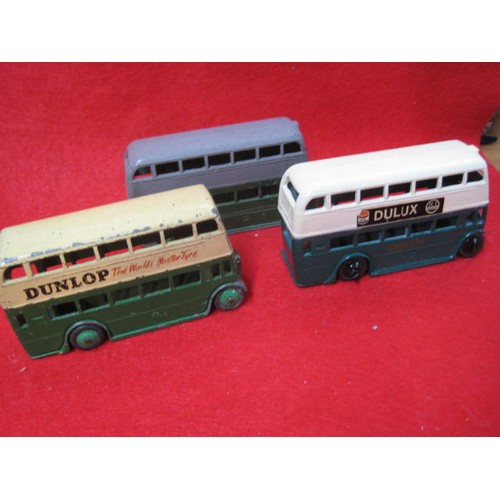 201 - 3 Dinky Buses two signwritten Dulux and Dunlop tyres the other plain.all fair condition