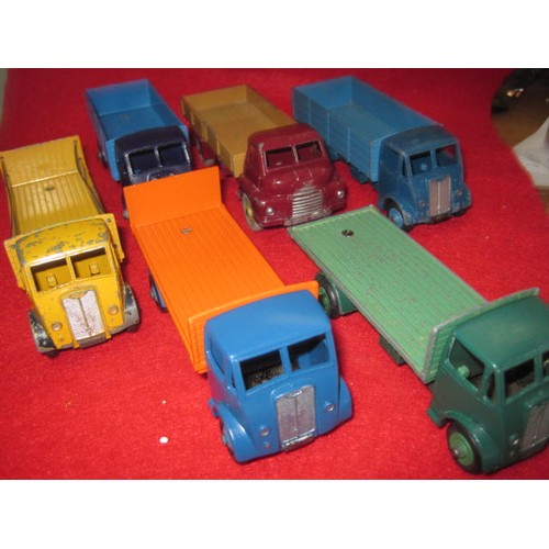 213 - Dinky supertoys Guy lorries  3 flatbed 2 low backed and a Dinky Big Bedford truck all in good condit... 