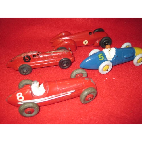 214 - 4 Dinky racing cars including an Alfa romeo and a Ferrari all in fair to good condition