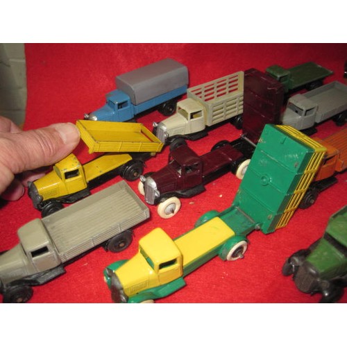 199 - 10 Dinky Tippers and rigid back 4 wheel lorrys in very good condition  2 highsided vehicles in the l... 