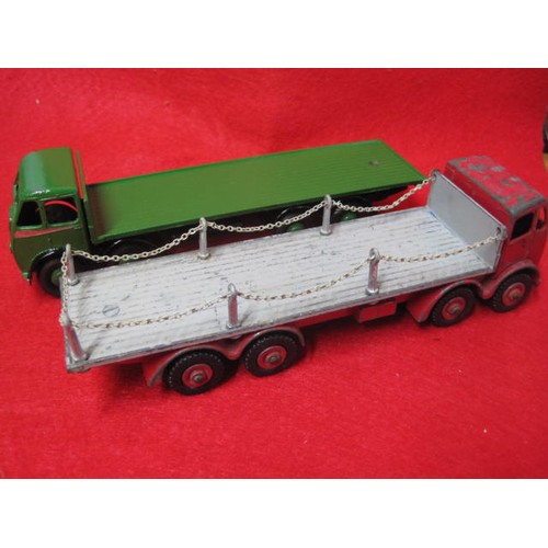 283 - 2 Eight-wheel Foden Trucks in good condition one green and one Red The red one with chain restraints... 