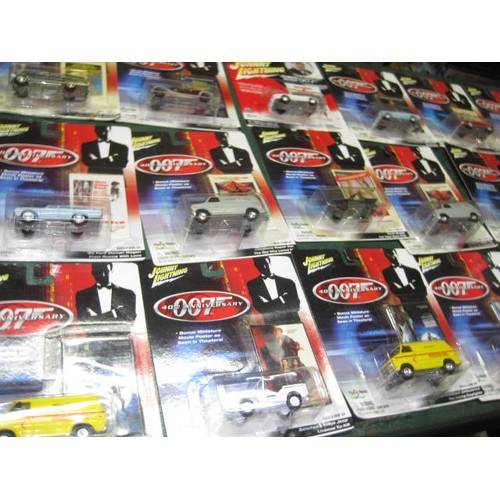 342 - 18 Johnny Lightning James Bond 40th Anniversary blister packed die cast cars from the films, each wi... 