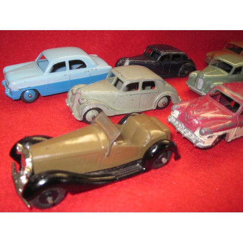 96 - A selection of 8 vintage Dinky cars comprising 172 Studebaker, playworn: 162 Ford Zephyr Playworn, a... 