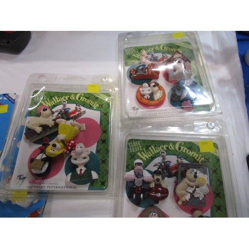 1326 - 3 packs of 4 Wallace and gromit fridge magnets 
mint carded