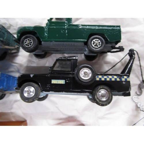 387 - 26 Corgi Land Rovers, some repaints but has the benefit of having some great models including 4 brea... 