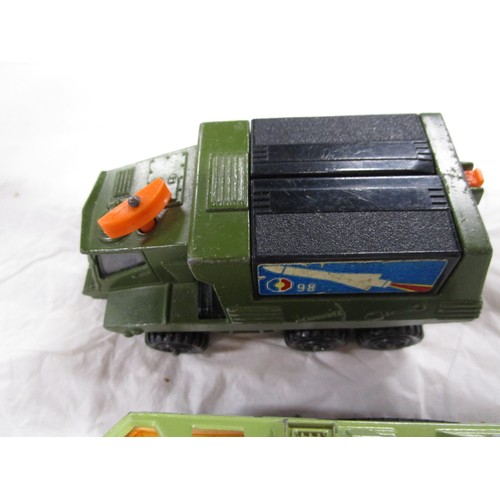 392 - Matchbox k 111 Misssle launcher with two missles and a Adventure 2000 vehicle both in good condition