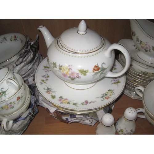 72 - A Wedgewood Mirabelle dinner service (60+ pieces)