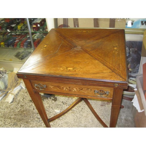 126 - A Victorian card table with inlaid top (slight a/f to top)