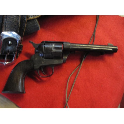 190 - A vintage replica Colt Army Single Action .45 in a heavy leather cowboy holster, both in good order