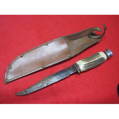 199 - A J Nowill & Sons of Sheffield Bowie Knife, in scabbard, steel blade with some surface rust, bone ha... 