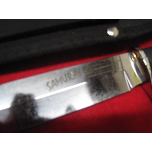 201 - Samuray sheath knife with Tramontina blade and webbing scabbard, appears unused, overall length 10