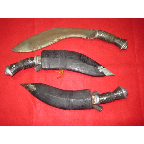 207 - A pair of small Gurkha Kukris, scabbarded, with Chakmaks and Kardas, rust to blades, plus one slight... 