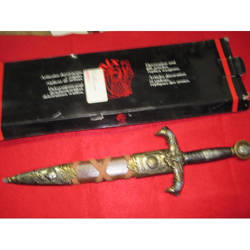 209 - A Denix 4139/L 'King Arthur's Dagger, boxed, damp damage to box and to knife finish but still good