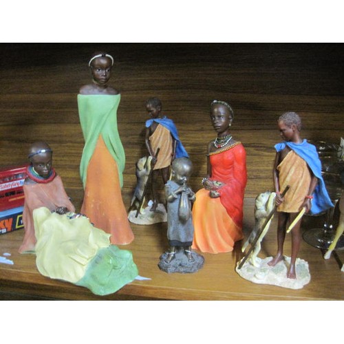 41 - A set of resin figures of Masai men and women