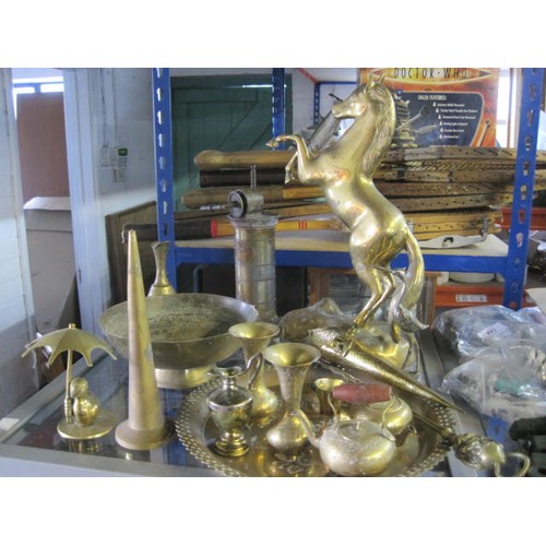 31 - An assortment of brassware including an imposing brass horse