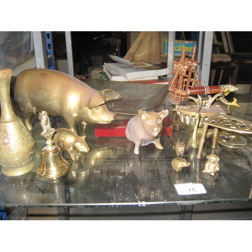 32 - An assortment of brassware including a large pig and two slightly smaller pigs, various animals etc