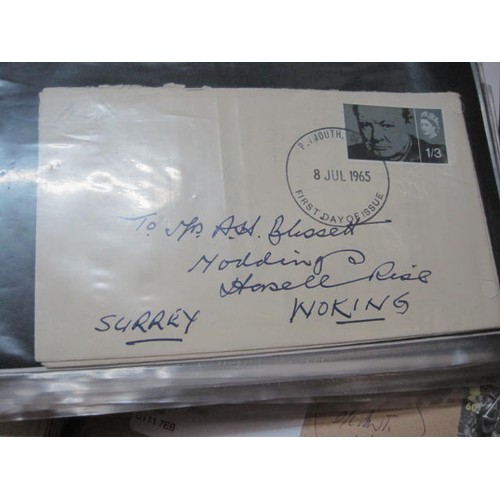 108 - A large collection of First Day Covers both loose and in albums, plus two folders of postal and stam... 