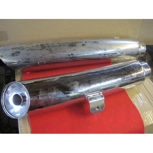 15 - A Harley Davidson VRSCA Muffler Kit comprising two exhaust cans, boxed and unused