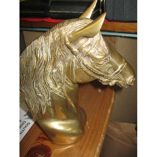 33 - A brass figure of a horse's head