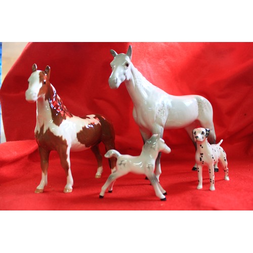 54 - 3 Beswick horses (A standing Dapple Grey (similar to #1564 but smaller, one ear a/f), A Grey Foal #1... 