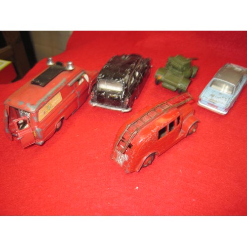 284 - A small group of playworn Dinky Toys including early fire engine, Transit Fire Engine, London Taxi, ... 