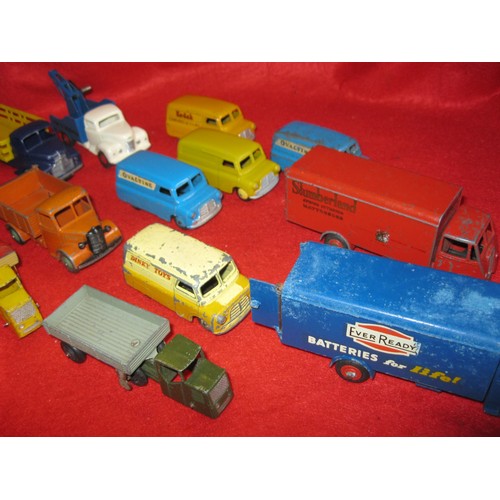 272 - An assortment of Dinky Toys commercial vehicles and trailers in playworn condition