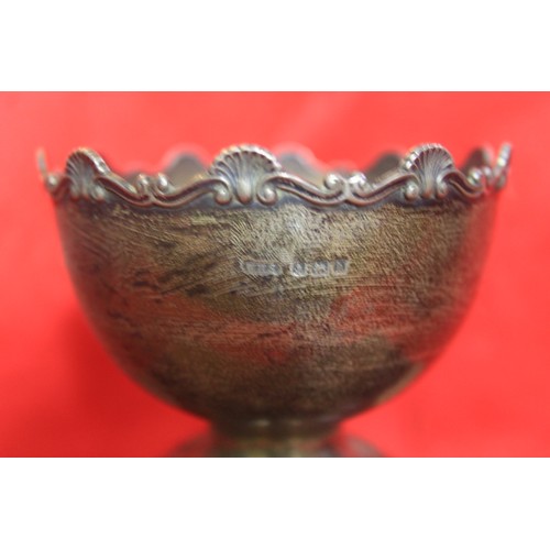 235 - A sterling silver hallmarked footed presentation bowl with ornate decoration to rim, hallmarked Birm... 