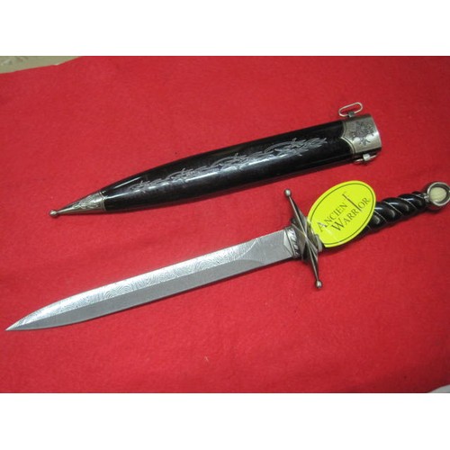 156 - A reproduction medieval-style dagger by Ancient Warrior, with tags, some storage marks, decorated sc... 