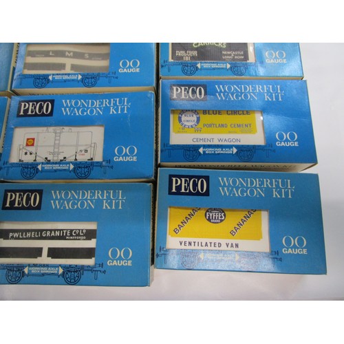 294 - 15 Peco wonderful wagon kits including a tanker wagon which has been part built.

There are 6 box va... 