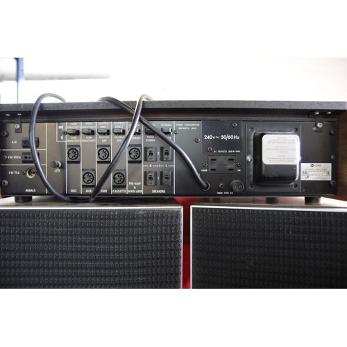 93 - A vintage Leak 2000 Stereo Receiver Amp plus a pair of Leak 2060 Speakers in Teak Casings, all in go... 