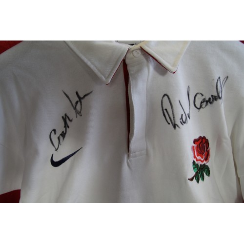 243 - Rugby World Cup 2003 winners' shirt (signed by Will Carling and others)

This clothing item is in ve... 